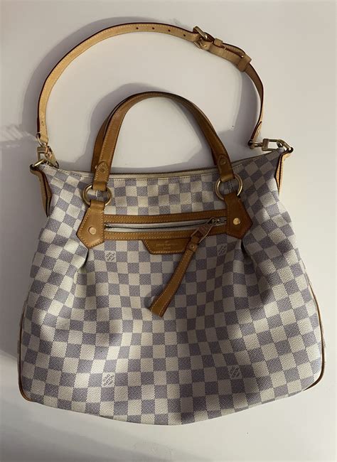 geanta louis vuitton originala pret